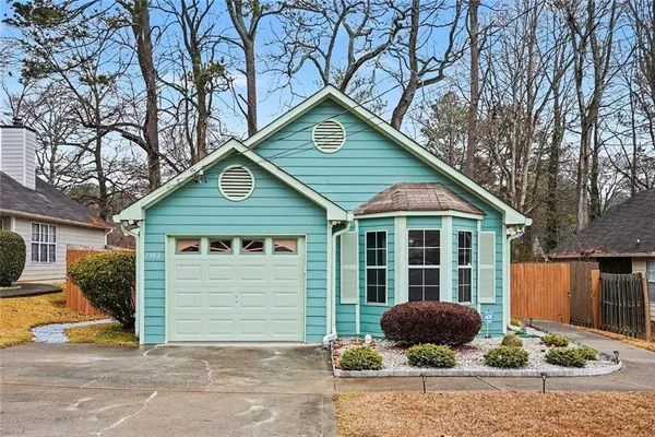a house view with a outdoor space