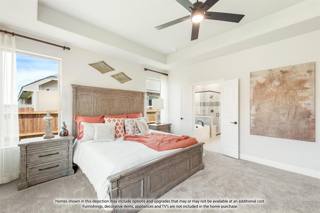 2411 Cornwall Lane Forney, TX 75126 - Photo 20 of 34 a bedroom with a bed a dresser and a large window