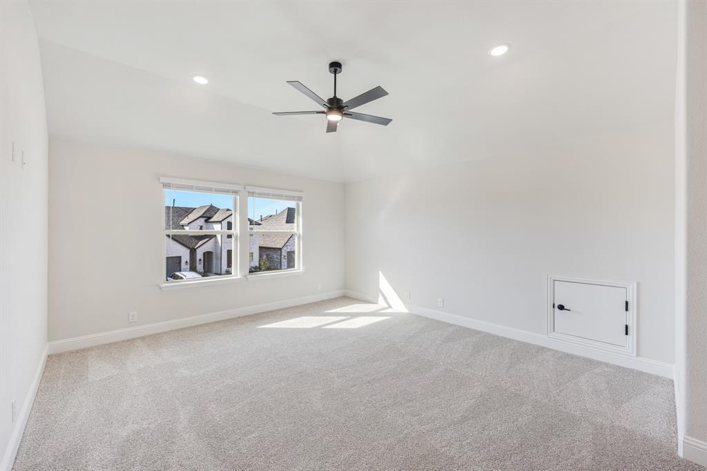 2411 Cornwall Lane Forney, TX 75126 - Photo 28 of 40 wooden floor in an empty room with a window
