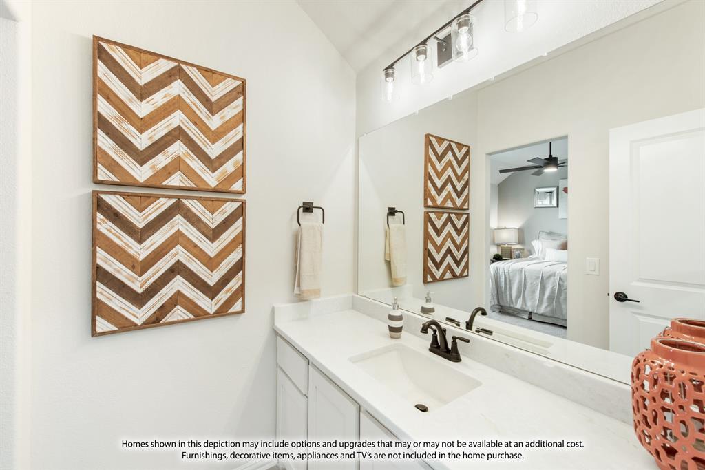 2411 Cornwall Lane Forney, TX 75126 - Photo 29 of 34 a bathroom with a sink and a mirror