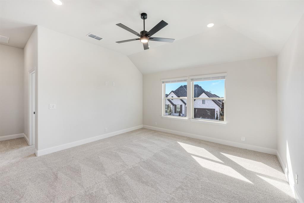 2411 Cornwall Lane Forney, TX 75126 - Photo 29 of 40 an empty room with window and ceiling fan