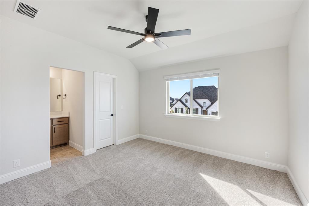 2411 Cornwall Lane Forney, TX 75126 - Photo 31 of 40 a view of an empty room with a window