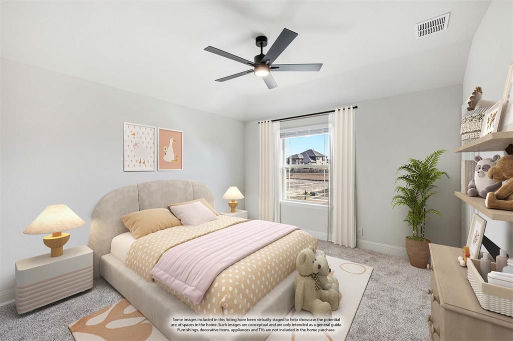 2411 Cornwall Lane Forney, TX 75126 - Photo 34 of 40 a bedroom with a bed and a potted plant