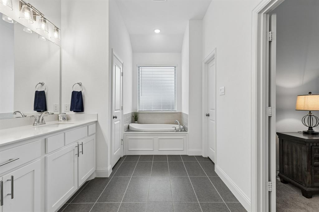 4933 Switchback Street Little Elm, TX 76227 - Photo 13 of 33 Garden tub for relaxing plus a giant walk in closet.