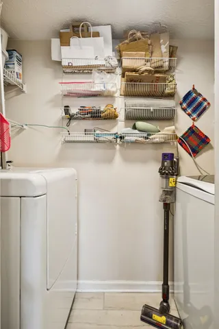 a bathroom with a sink toilet a mirror and shower curtain