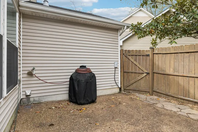 a backyard of a house with lots of green space