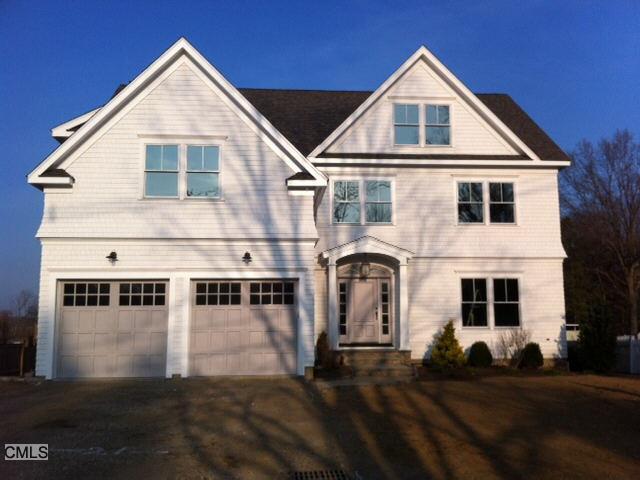 19 Colonial Road Westport, CT 06880 - Photo 1 of 1 a view of a white house with large windows