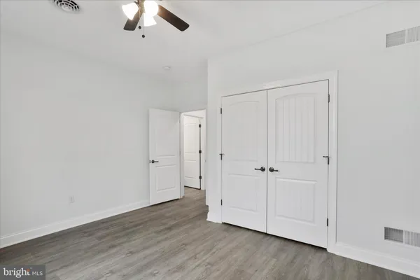 a bathroom with a toilet a sink and bathtub