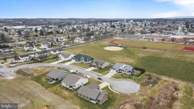 a view of house and outdoor space with swimming pool