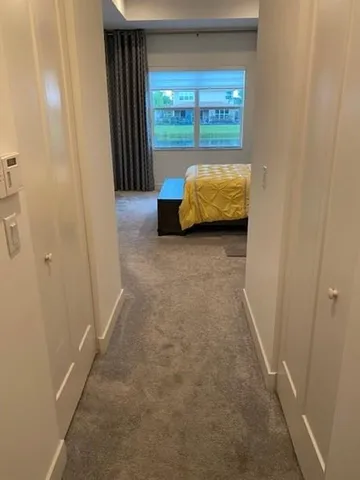 a bedroom with window