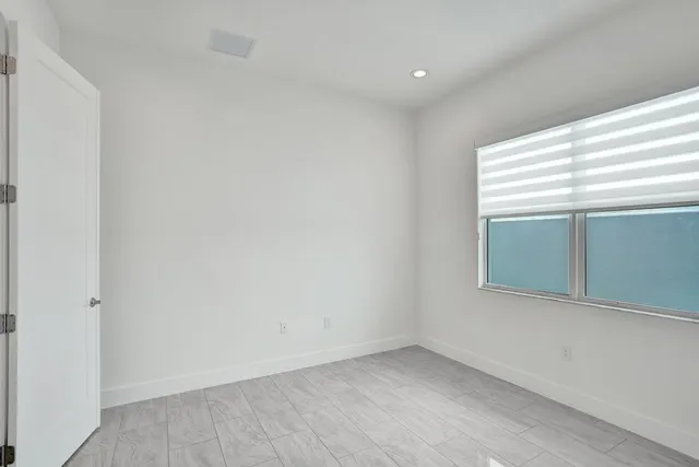 a bathroom with a bathtub and a sink
