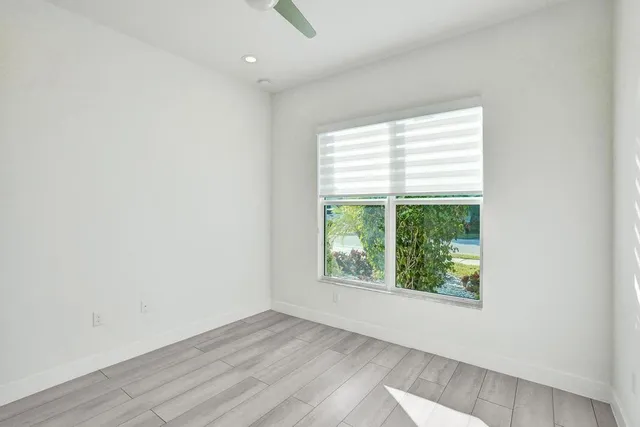 a view of a bathroom from a hallway