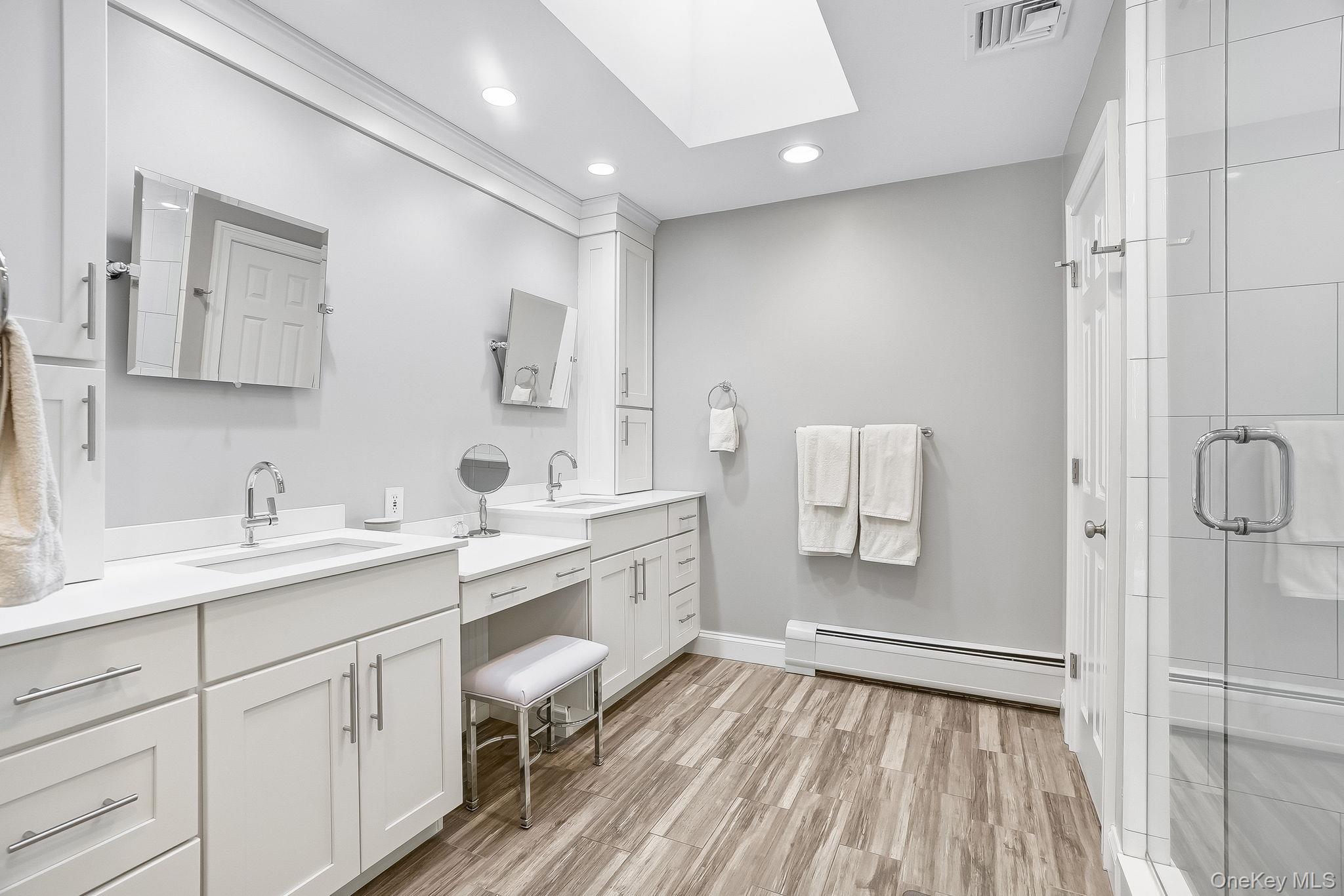 2 Hemlock Rise Armonk, NY 10504 - Photo 22 of 48 Spa- inspired primary bathroom with skylight