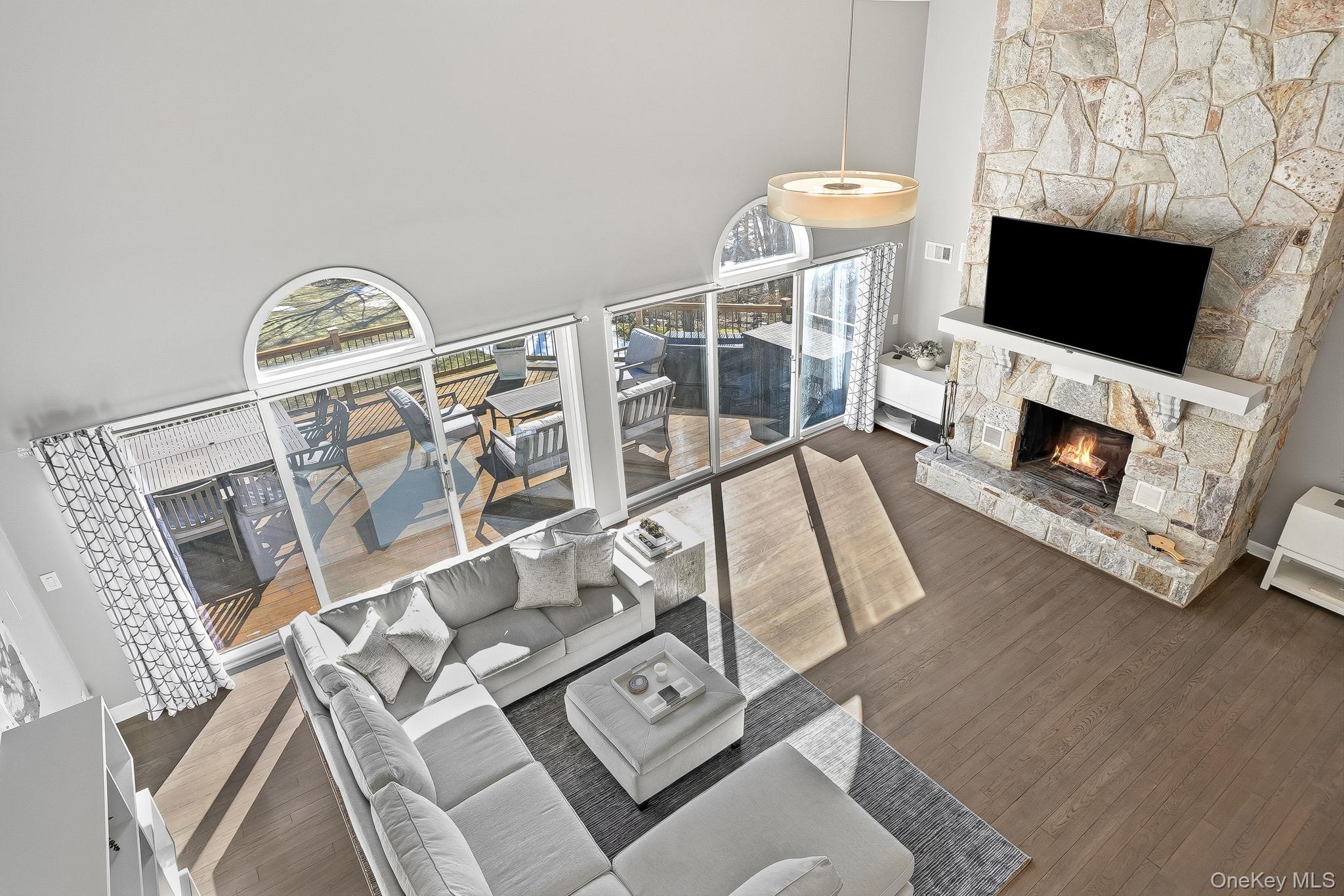 2 Hemlock Rise Armonk, NY 10504 - Photo 10 of 48 Stunning Floor to Ceiling Wood-Burning Stone Fireplace