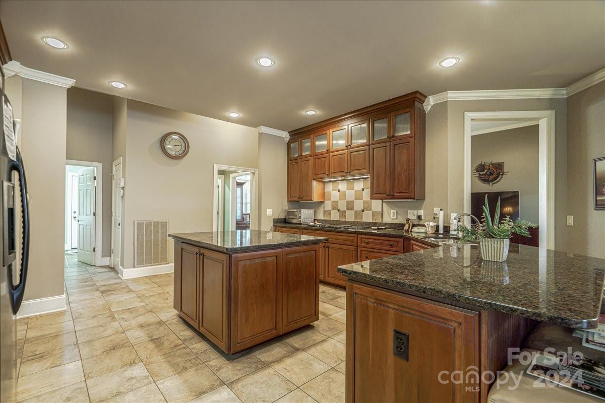 545 State Rd S-13-756 Chesterfield, SC 29709 - Photo 22 of 45 a kitchen with stainless steel appliances granite countertop a sink and cabinets