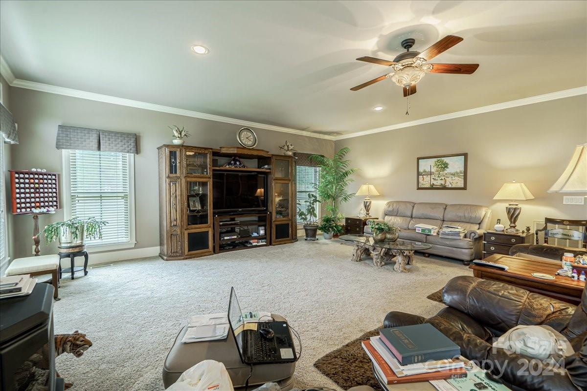 545 State Rd S-13-756 Chesterfield, SC 29709 - Photo 26 of 45 a living room with furniture and a flat screen tv
