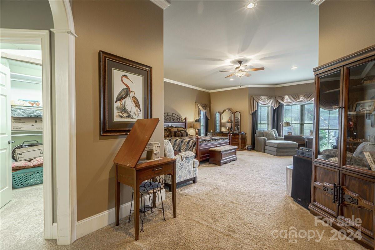 545 State Rd S-13-756 Chesterfield, SC 29709 - Photo 34 of 45 a living room with furniture a window and a chandelier