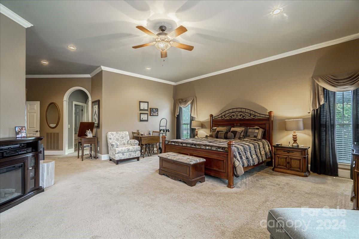 545 State Rd S-13-756 Chesterfield, SC 29709 - Photo 36 of 45 a bedroom with bed and a chandelier