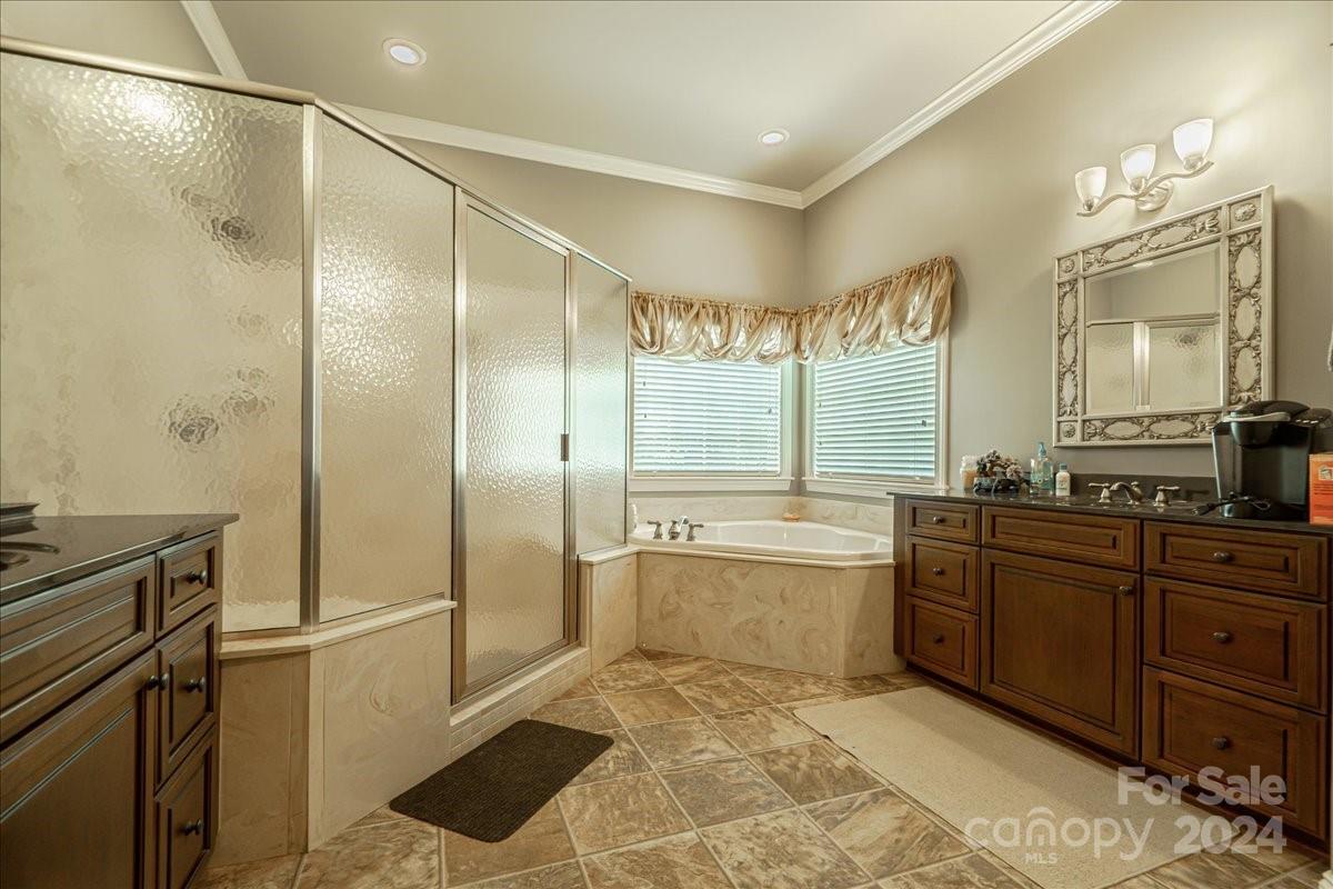 545 State Rd S-13-756 Chesterfield, SC 29709 - Photo 38 of 45 a bathroom with a tub sink shower and mirror