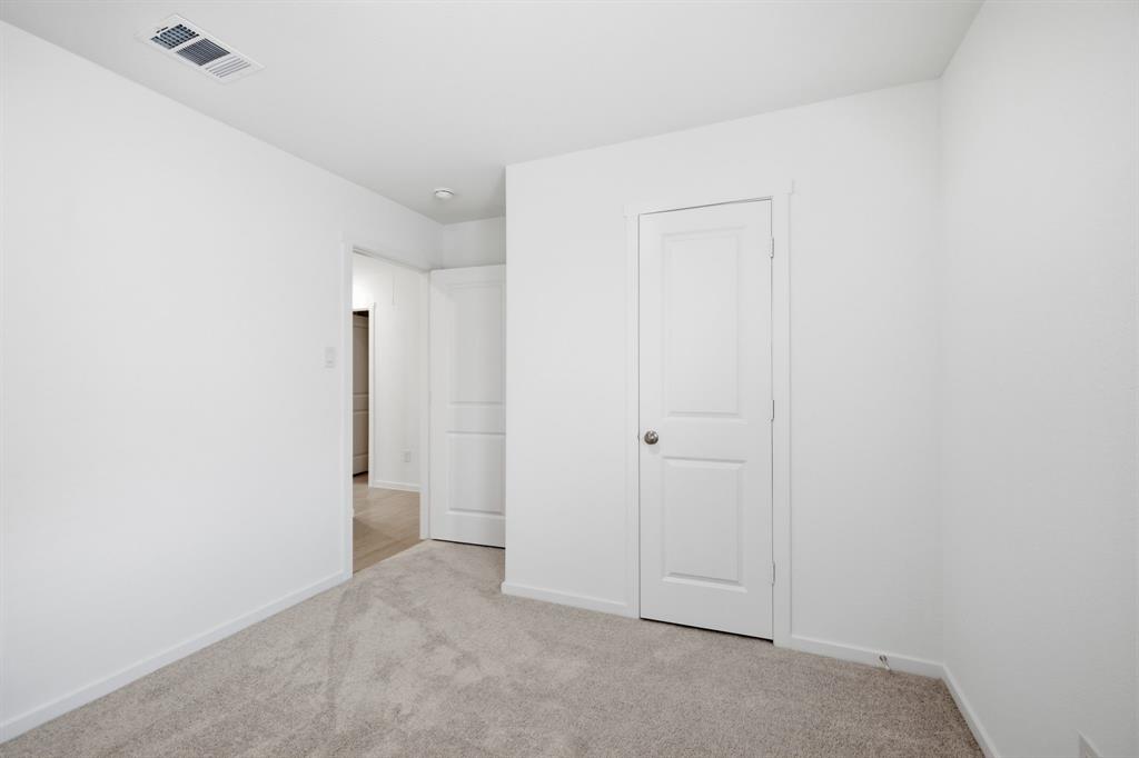 2128 Doc Holliday Road Joshua, TX 76058 - Photo 11 of 28 Interior room with neutral carpeting and white walls
