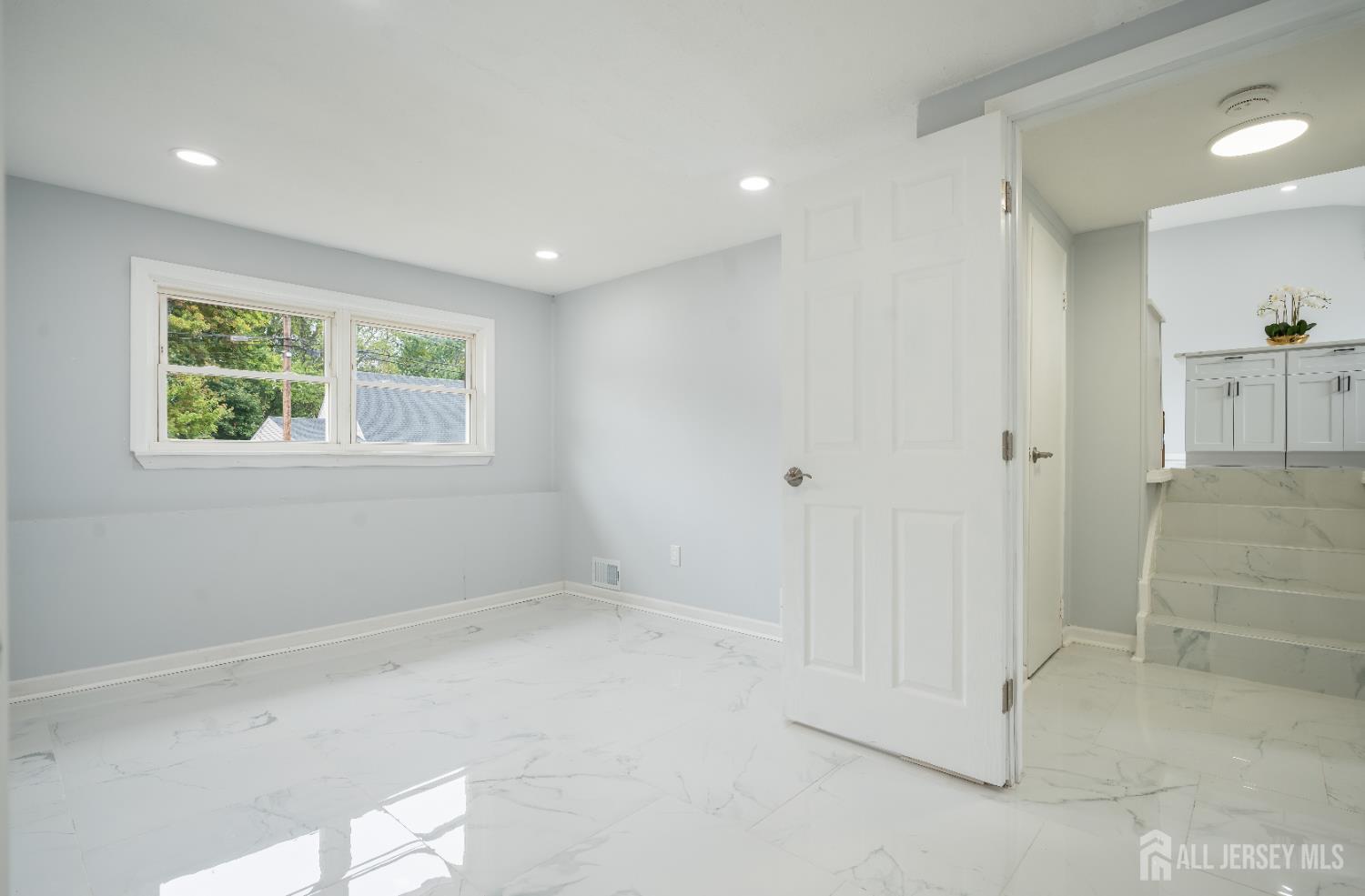 106 Boulevard West Old Bridge, NJ 07735 - Photo 17 of 34 a view of an empty room with a window