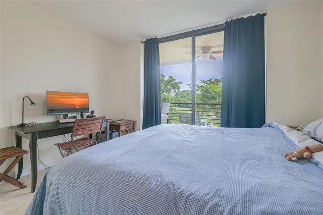 an aerial view of a house with a ocean view