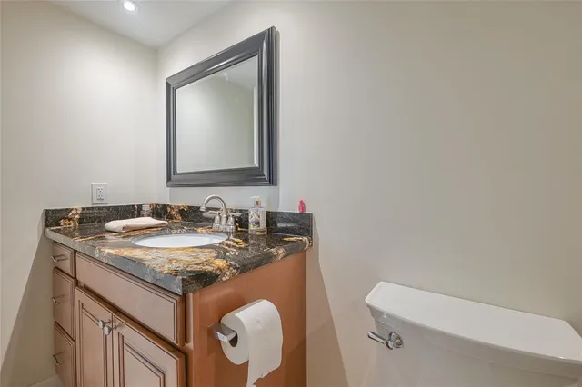 a view of swimming pool with outdoor seating