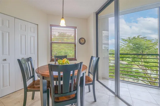 a bed room with furniture and a flat screen tv