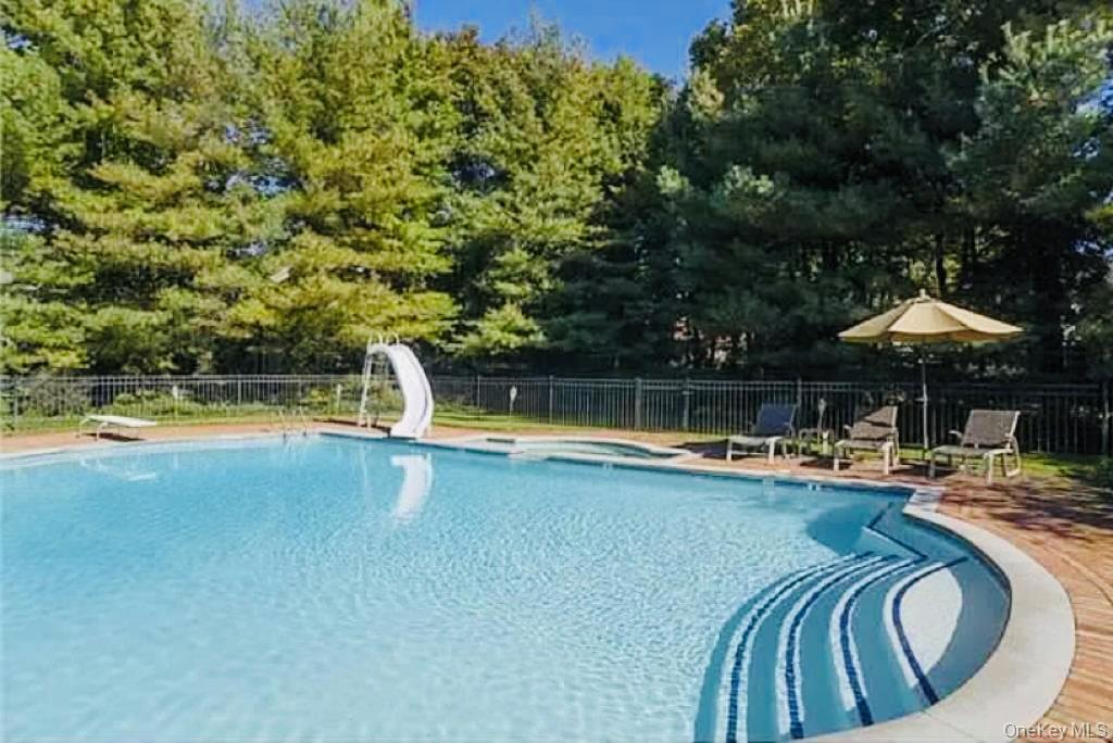 22 Willow Road Woodmere, NY 11598 - Photo 22 of 27 a view of a swimming pool with lounge chair
