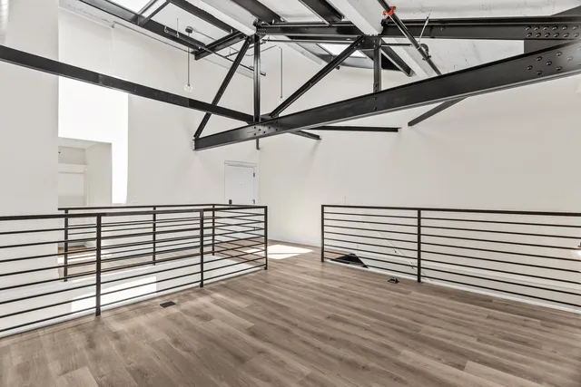 a view of a room with racks on the wall