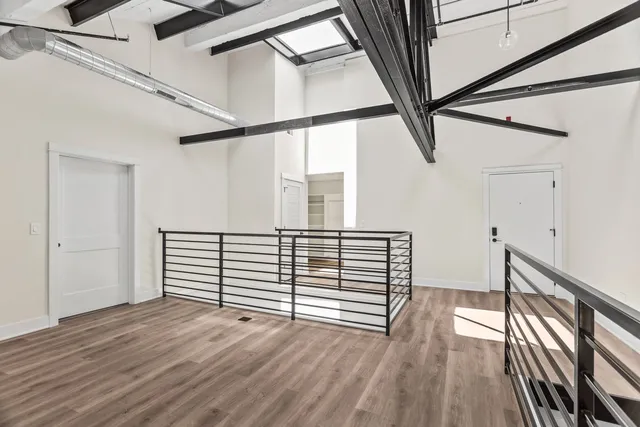 a view of entryway with wooden floor