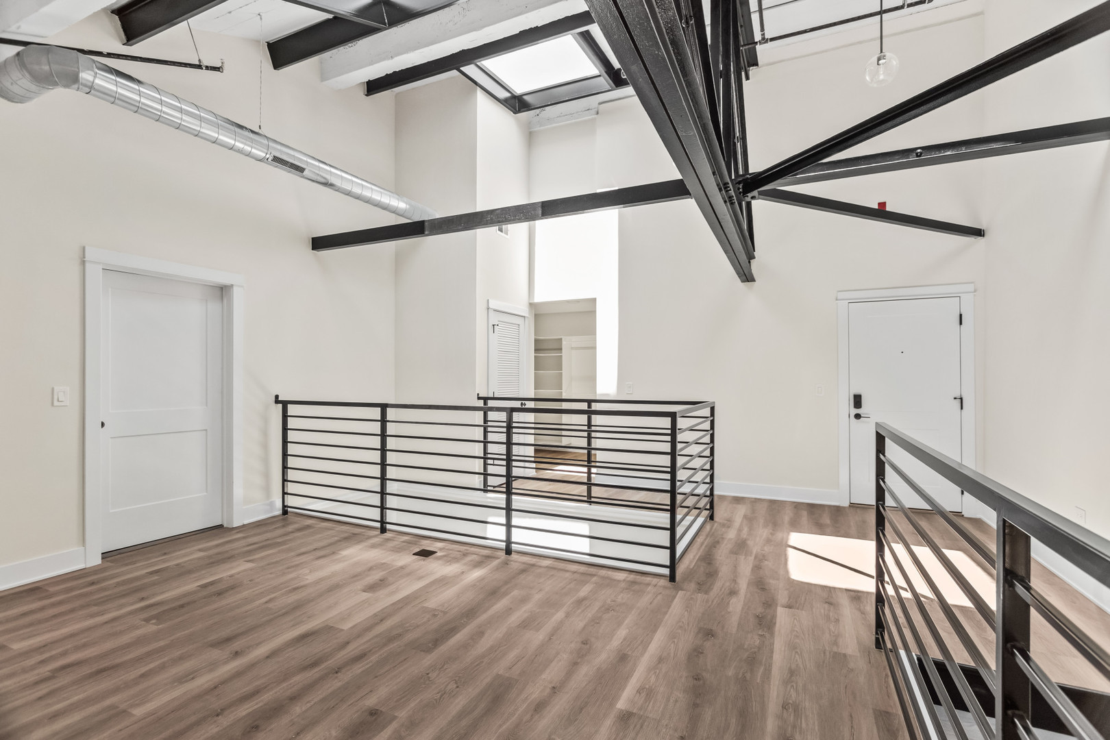 1453 Maple Avenue, Unit 201 Evanston, IL 60201 - Photo 14 of 25 a view of entryway with wooden floor
