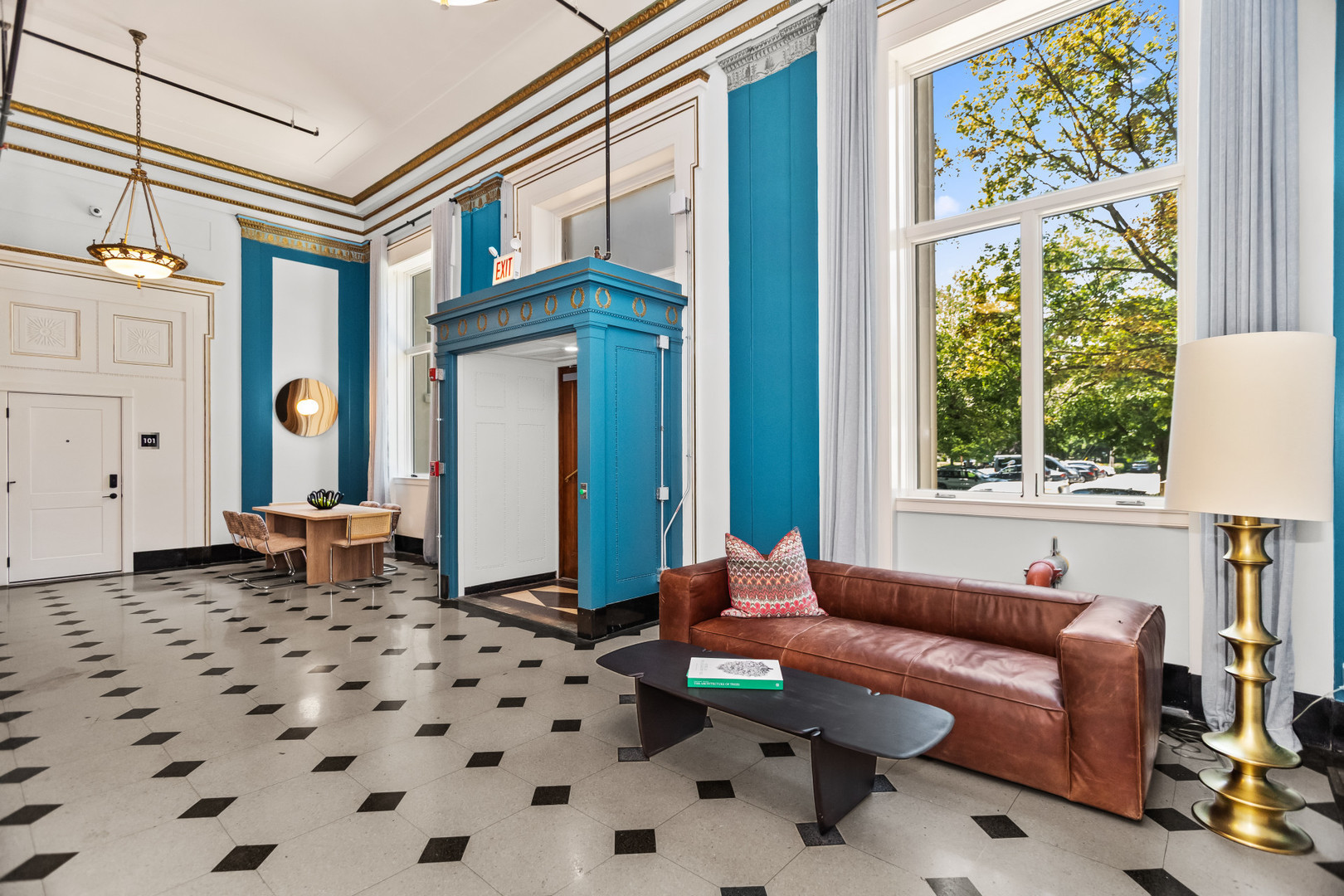 1453 Maple Avenue, Unit 201 Evanston, IL 60201 - Photo 20 of 25 a living room with furniture and a window