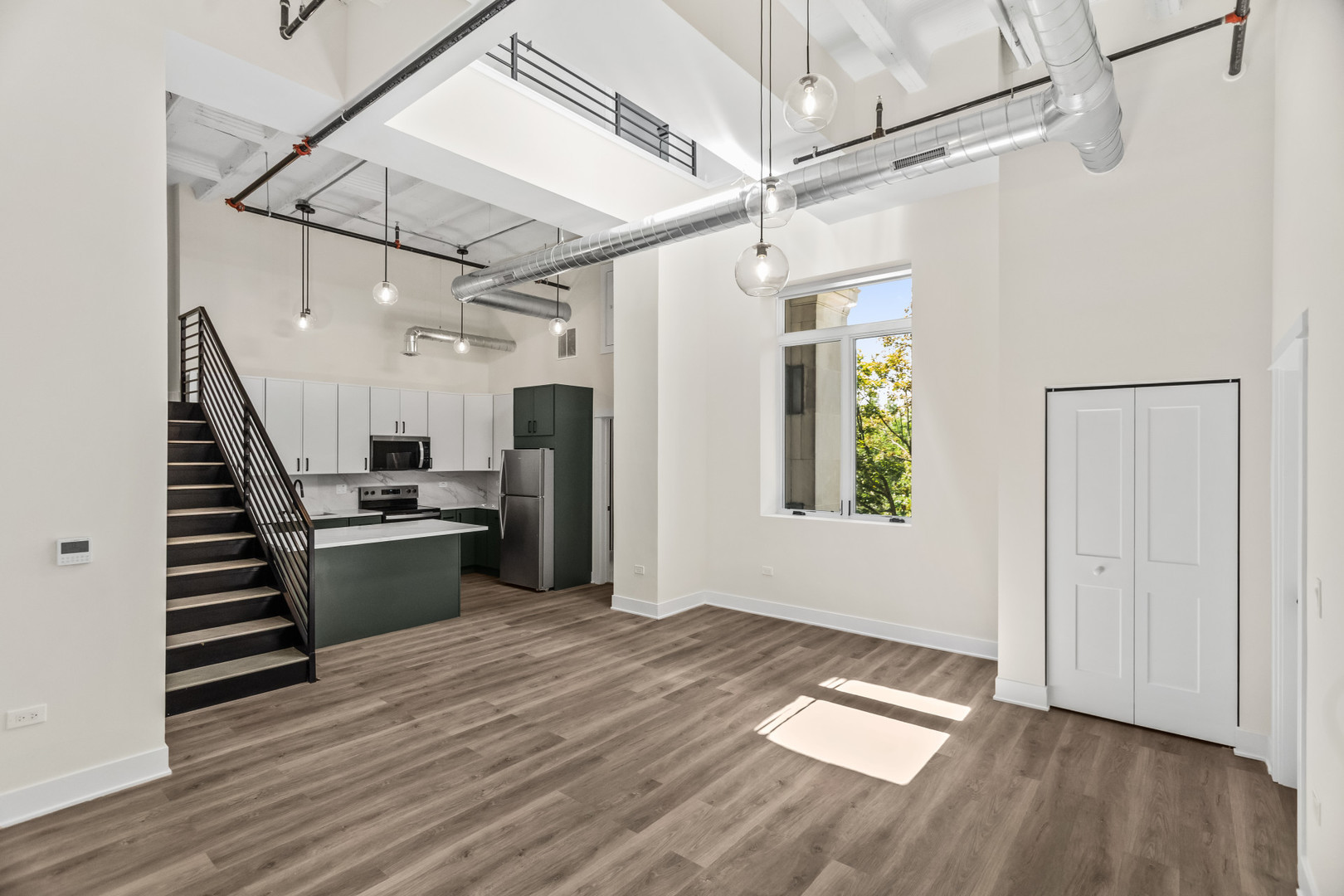 1453 Maple Avenue, Unit 201 Evanston, IL 60201 - Photo 3 of 25 a view of entryway and hall with wooden floor