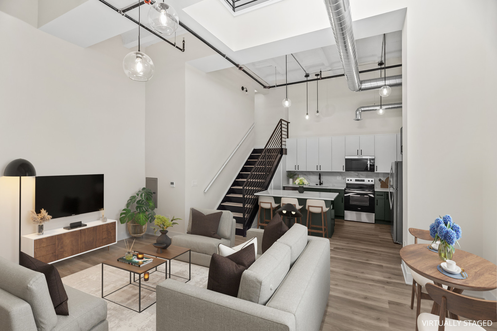 1453 Maple Avenue, Unit 201 Evanston, IL 60201 - Photo 4 of 25 a living room with furniture and a flat screen tv