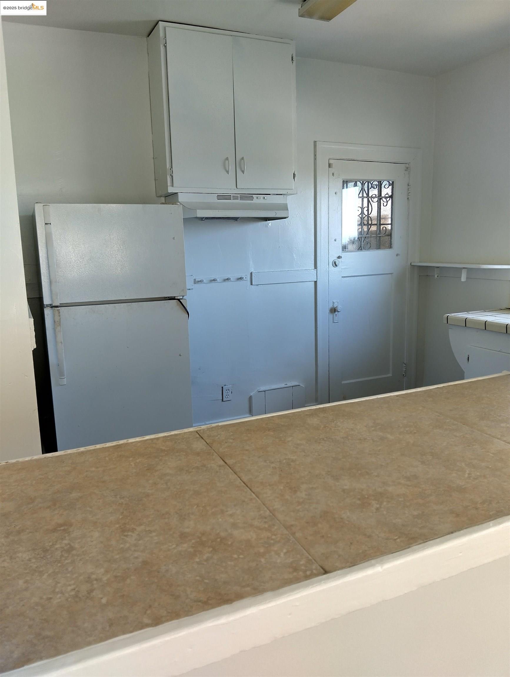 1864 11th Avenue Oakland, CA 94606 - Photo 19 of 46 a view of cupboard