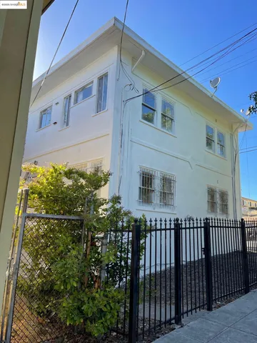 a front view of a house with a glass windows