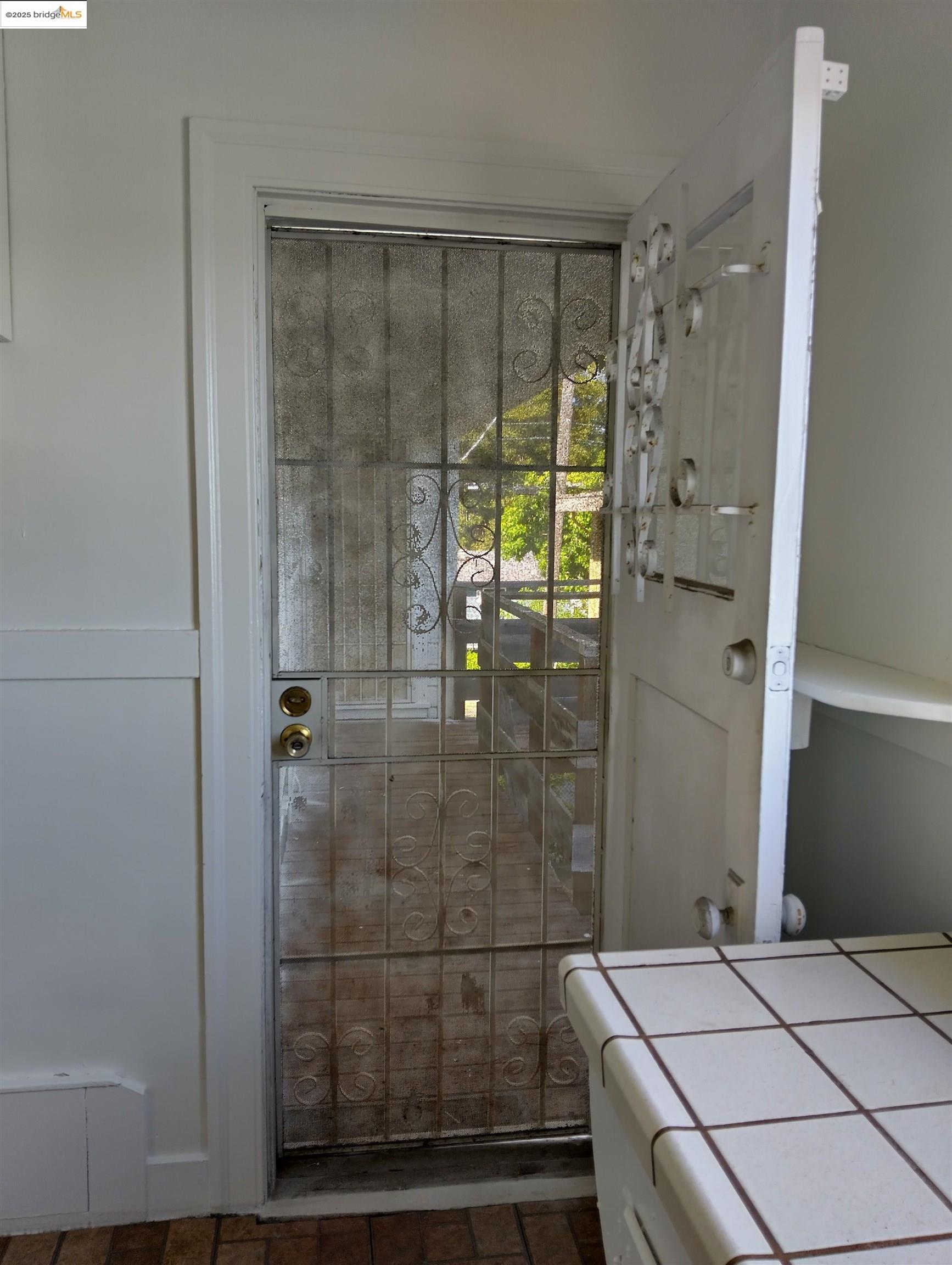 1864 11th Avenue Oakland, CA 94606 - Photo 34 of 46 a bathroom with a shower and a sink