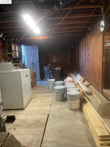 a dining room with furniture and a chandelier