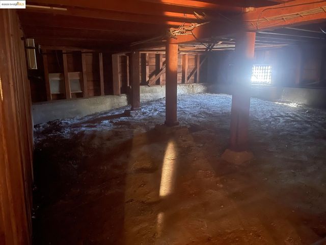 a view of a wooden door and outdoor space