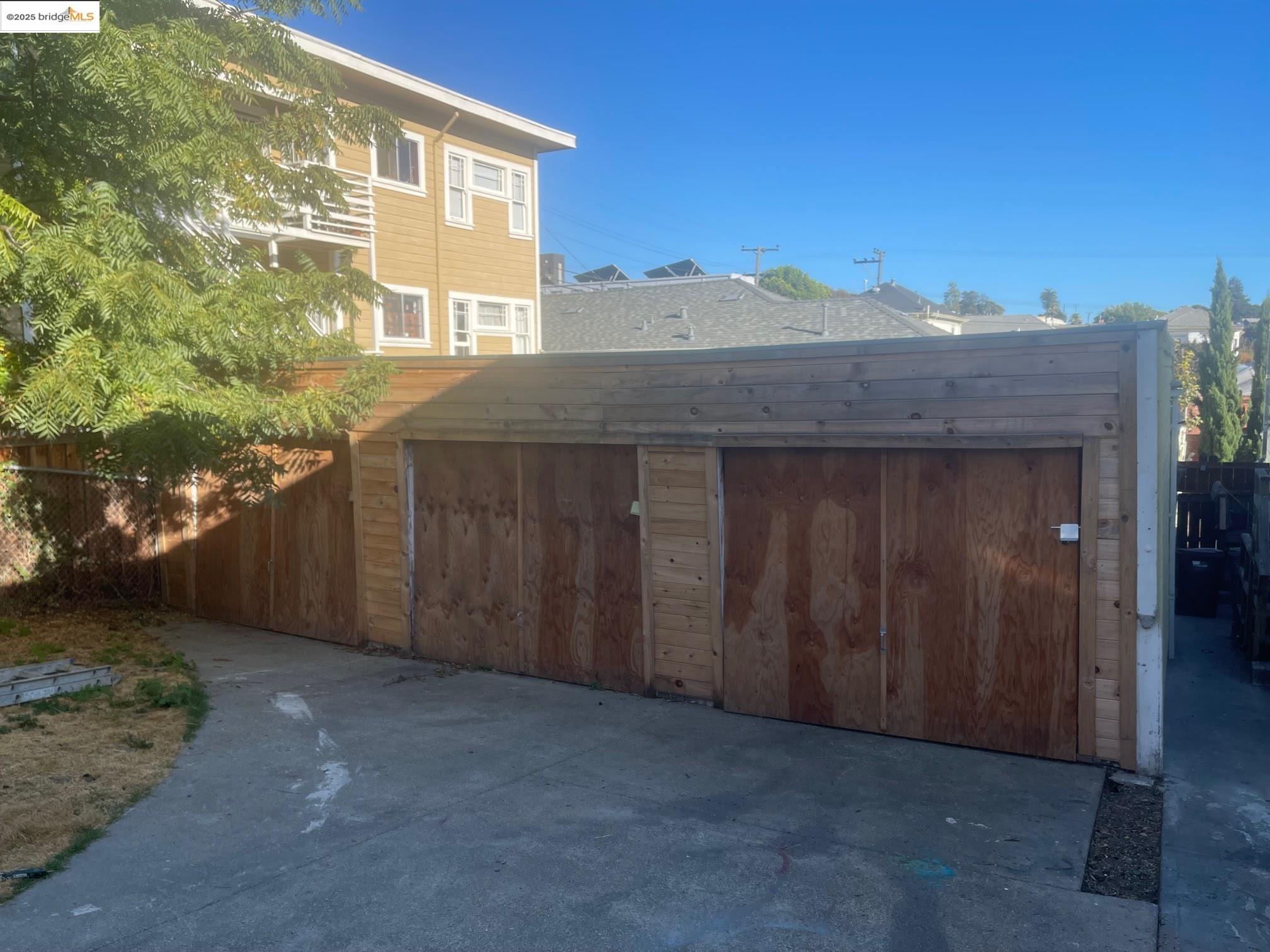 1864 11th Avenue Oakland, CA 94606 - Photo 43 of 46 a view of a wooden door and outdoor space