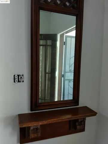 a view of a yard from a balcony