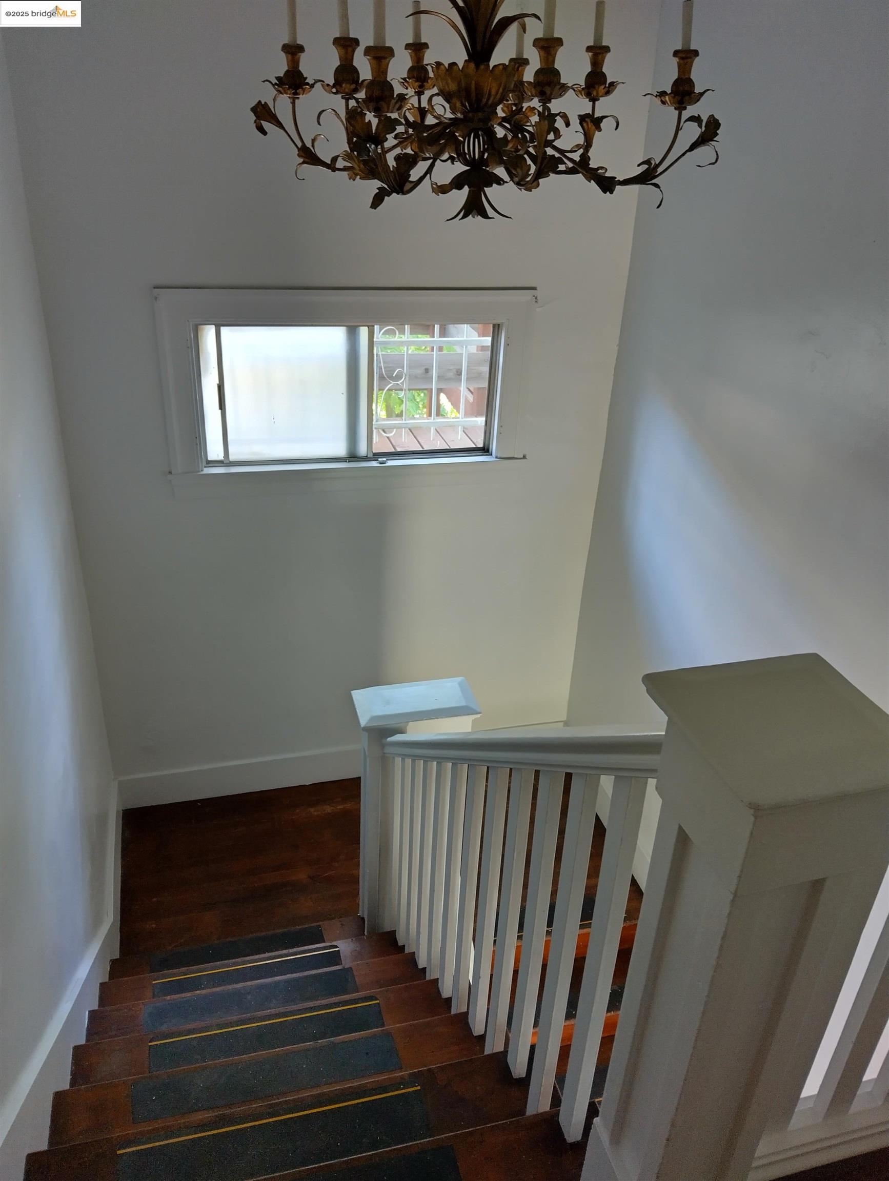 1864 11th Avenue Oakland, CA 94606 - Photo 8 of 46 a view of entryway and hall with wooden floor