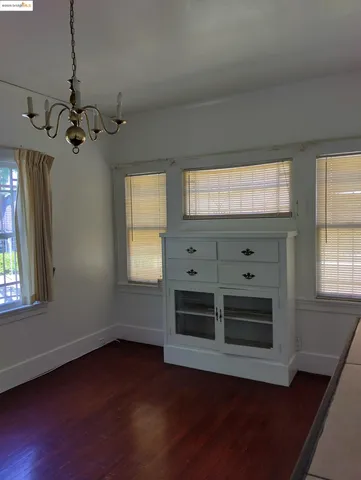 a view of a livingroom with furniture and windows