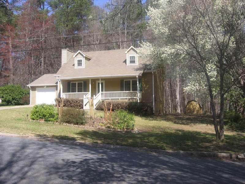 2664 Tucson Way Powder Springs, GA 30127 - Photo 1 of 1 Exterior Front. House w/ outdoor storage building
