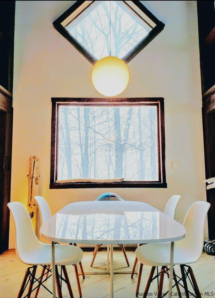 66 Hill Road Kingston, NY 12401 - Photo 16 of 32 a view of a dining room with furniture and wooden floor