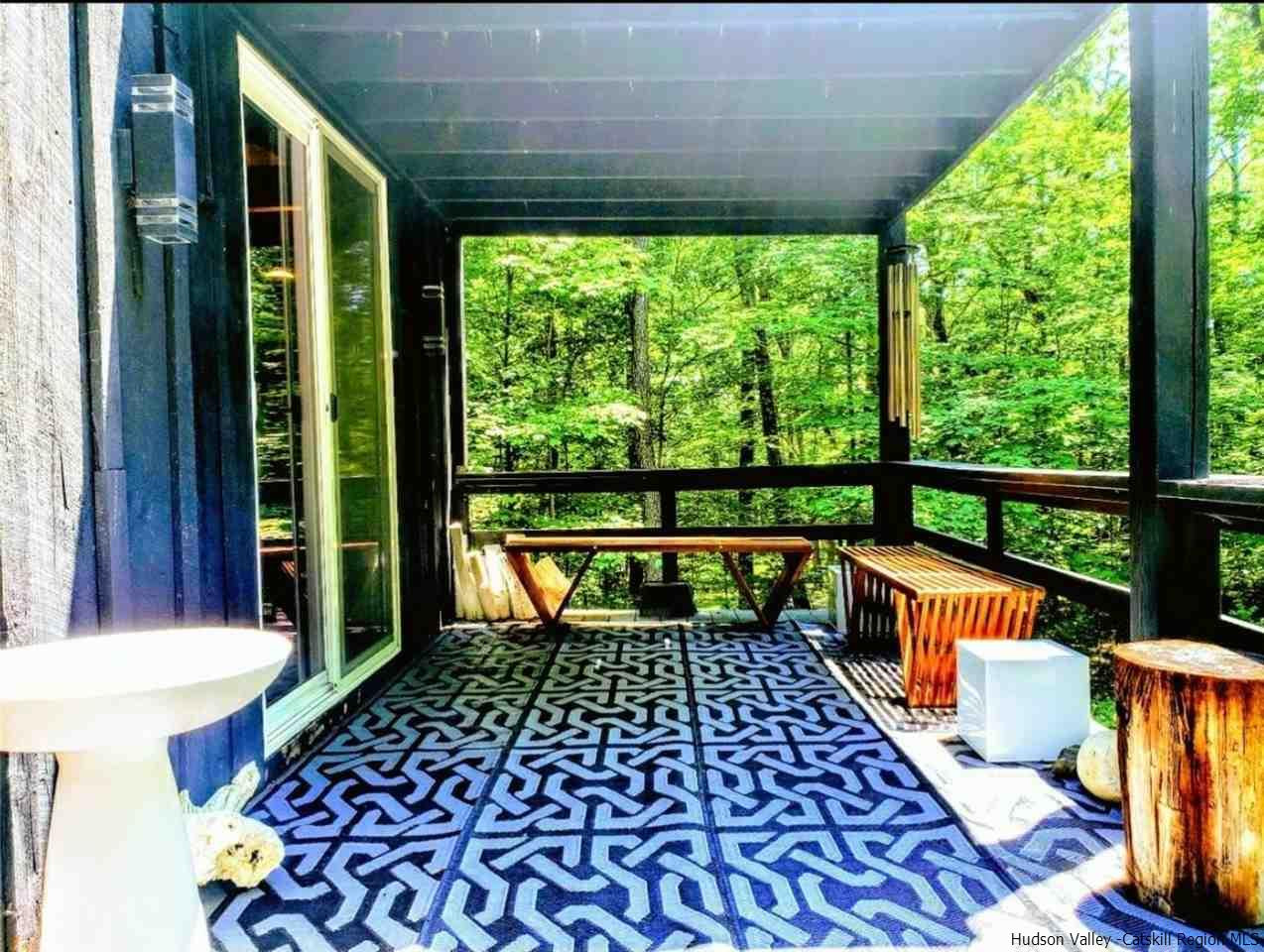 66 Hill Road Kingston, NY 12401 - Photo 5 of 32 a balcony with furniture and wooden floor