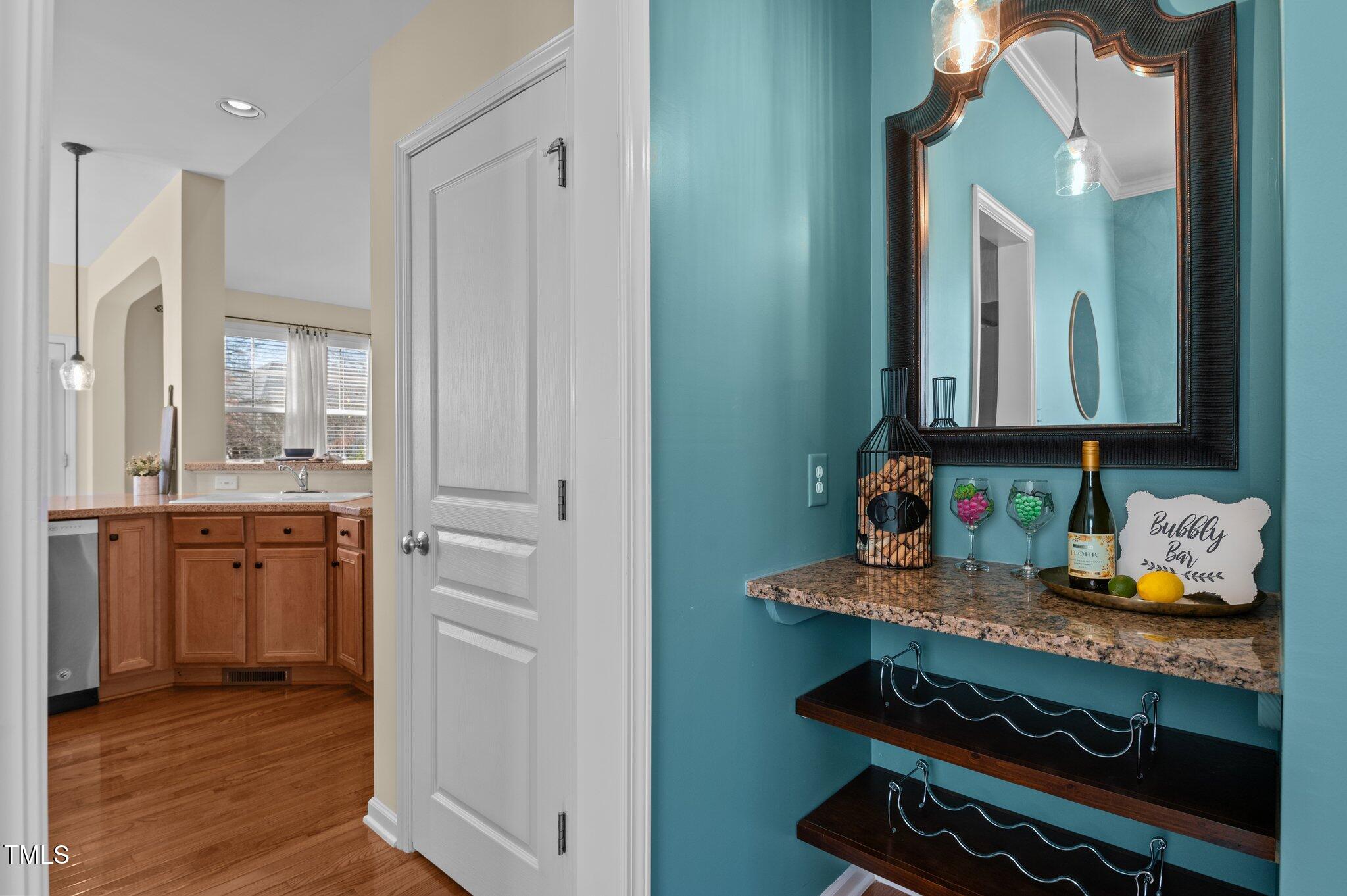 9117 Cornwell Drive Wake Forest, NC 27587 - Photo 12 of 50 a bathroom with sink a mirror and vanity