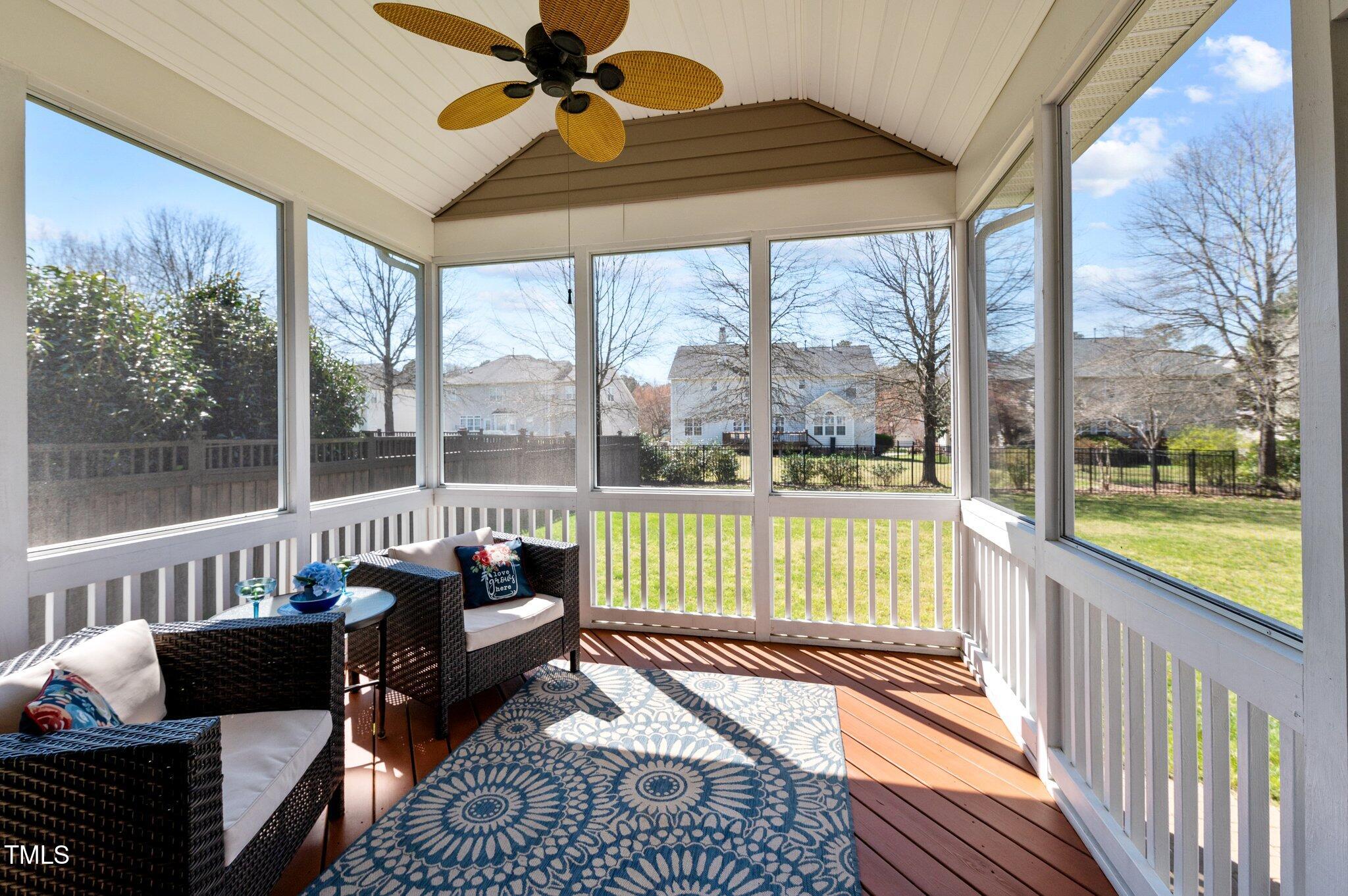 9117 Cornwell Drive Wake Forest, NC 27587 - Photo 19 of 50 a balcony with furniture and a garden