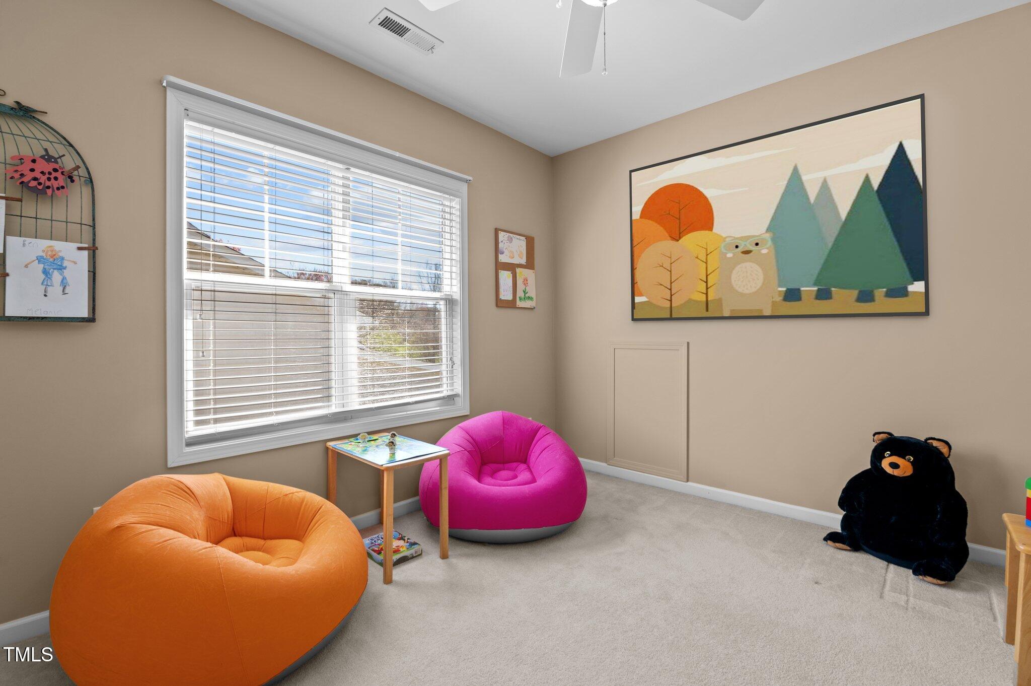 9117 Cornwell Drive Wake Forest, NC 27587 - Photo 32 of 50 a bedroom with a bed and window